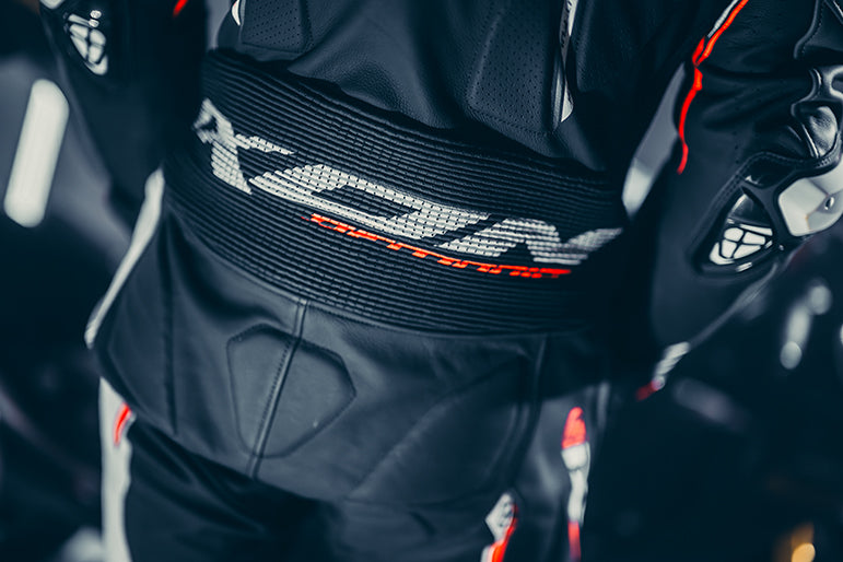 IXON Demonio Einteiler Kožno odijelo – Perforirano odijelo za trkače | Muškarci | Crno/Bijelo/Crveno 